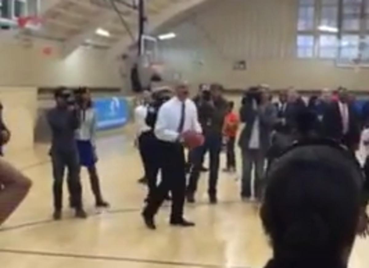 Video Attorney General Eric Holder plays basketball Sports Illustrated