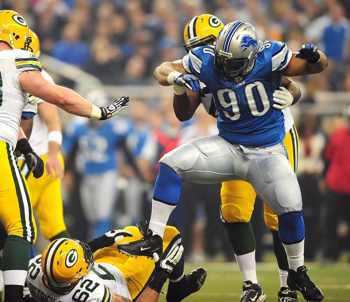 2011-1124-Ndamukong-Suh-Evan-Dietrich-Smith.jpg