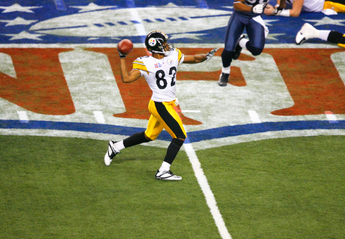 Randle-El, a college QB, took the reverse from Parker and threw long.