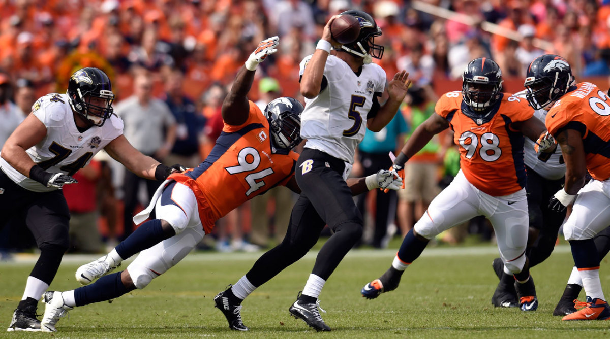 DeMarcus Ware and the Broncos hit Flacco eight times and limited the Ravens’ offense to two field goals. (Photo: Doug Pensinger/Getty Images)