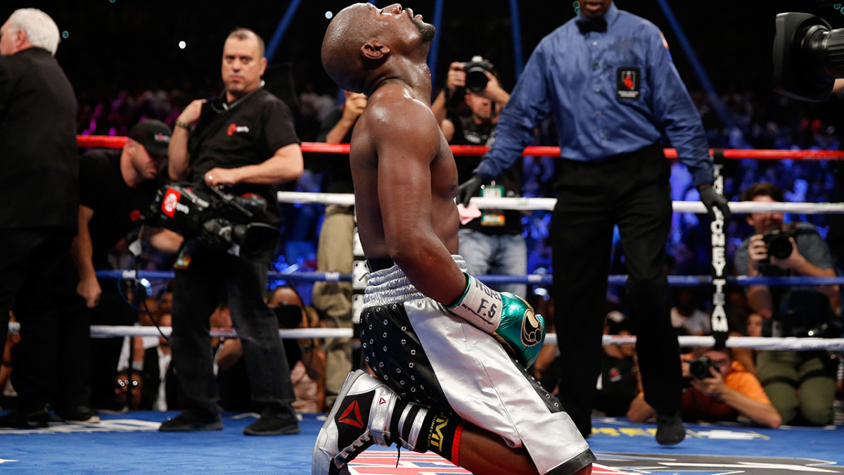 Floyd Mayweather wins by unanimous decision Sports Illustrated