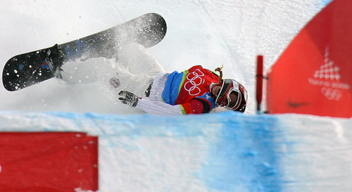 Lindsey Jacobellis falls to lose first place during the Ladies' Snowboard Cross final at the Turin Winter Olympics in 2006.