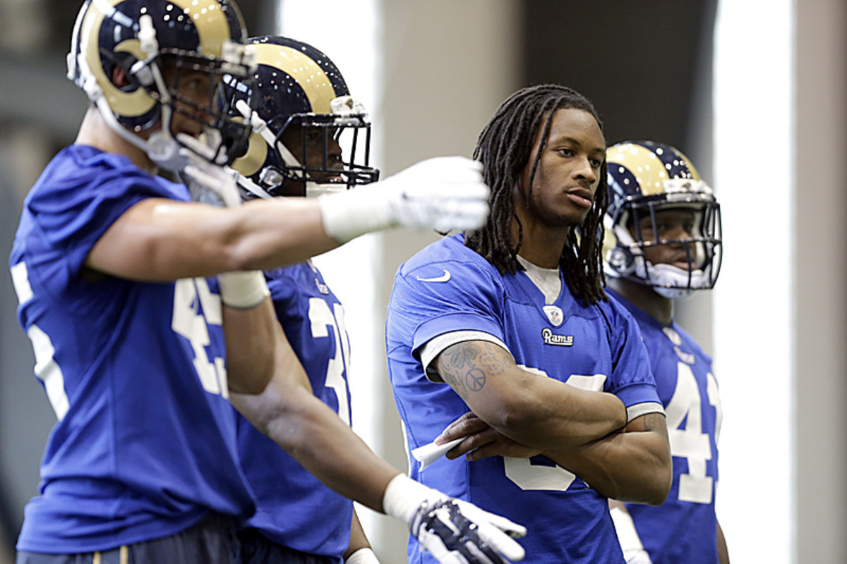 For Gurley (no helmet), the wait for a return to the field continued at minicamp. (Jeff Roberson/AP)
