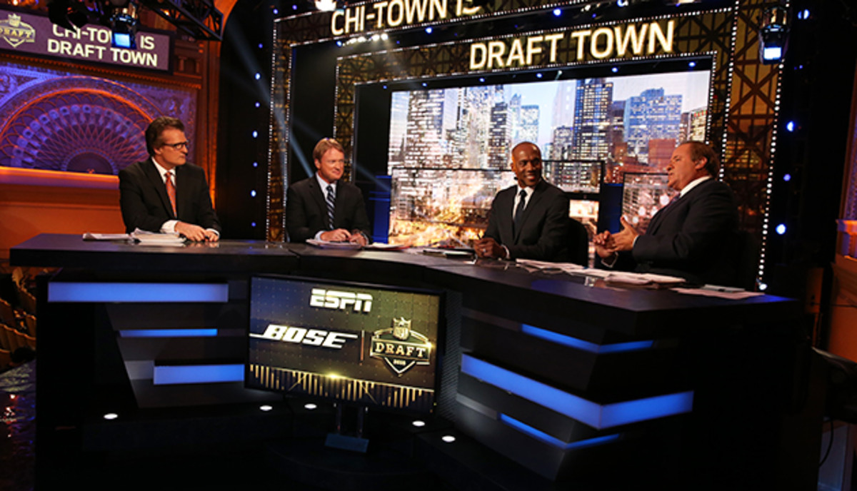 Mel Kiper Jr., Jon Gruden, Louis Riddick and Chris Berman on ESPN's NFL draft set in Chicago.