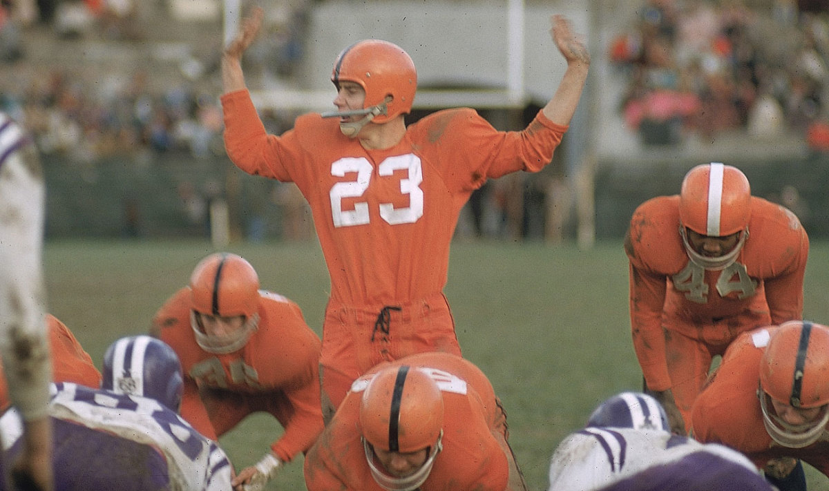 Brown (right, at Syracuse in 1956) typically lined up in a two-man split backfield a few yards behind the quarterback, meaning he had to read the play and hit the hole more quickly than tailbacks who came later. (Richard Meek/Sports Illustrated)  