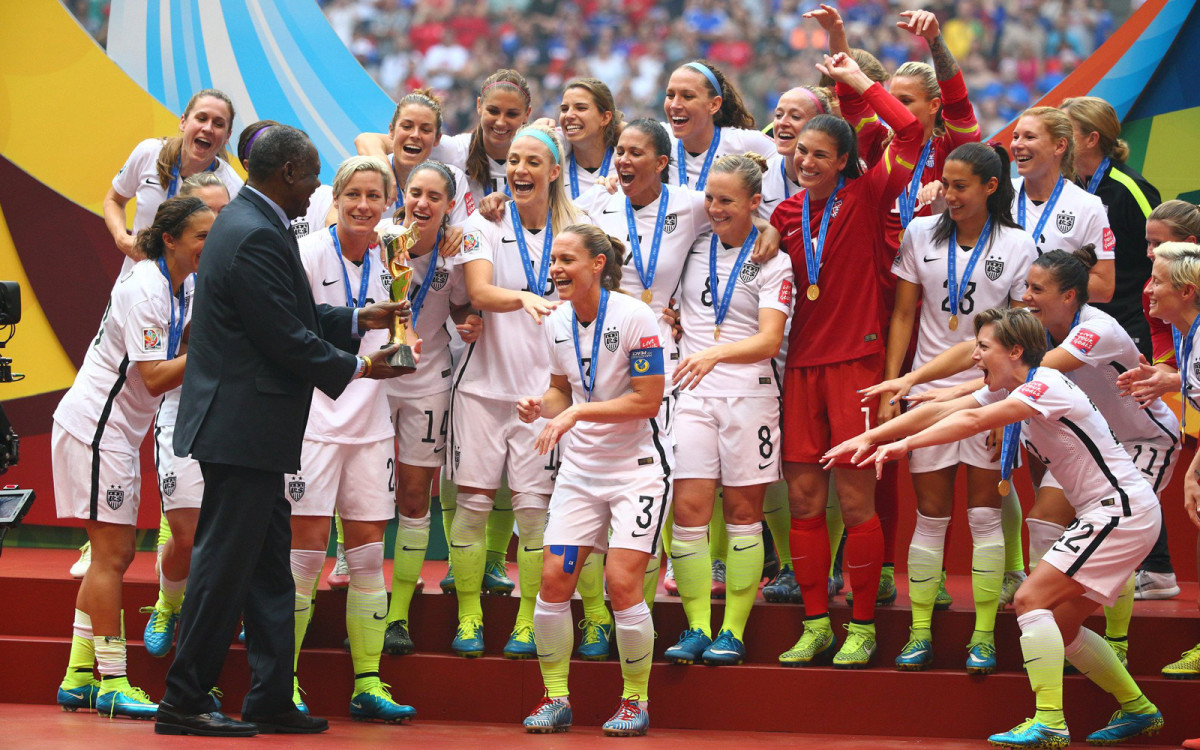 rampone-receives-world-cup-trophy.jpg