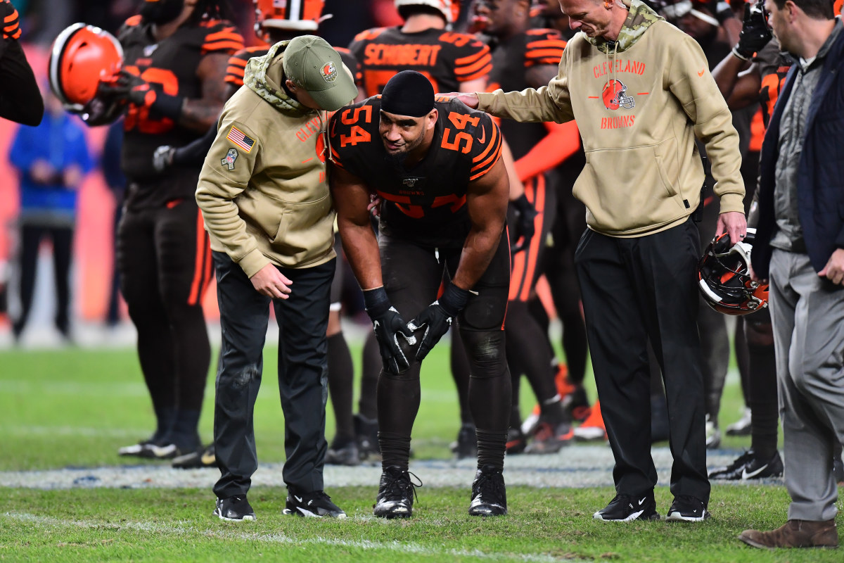 Nov 3, 2019; Denver, CO, USA; Cleveland Browns defensive end Olivier Vernon (54) is escorted off the field following an injury in the fourth quarter against the Denver Broncos at Empower Field at Mile High. Mandatory Credit: Ron Chenoy-USA TODAY Sports