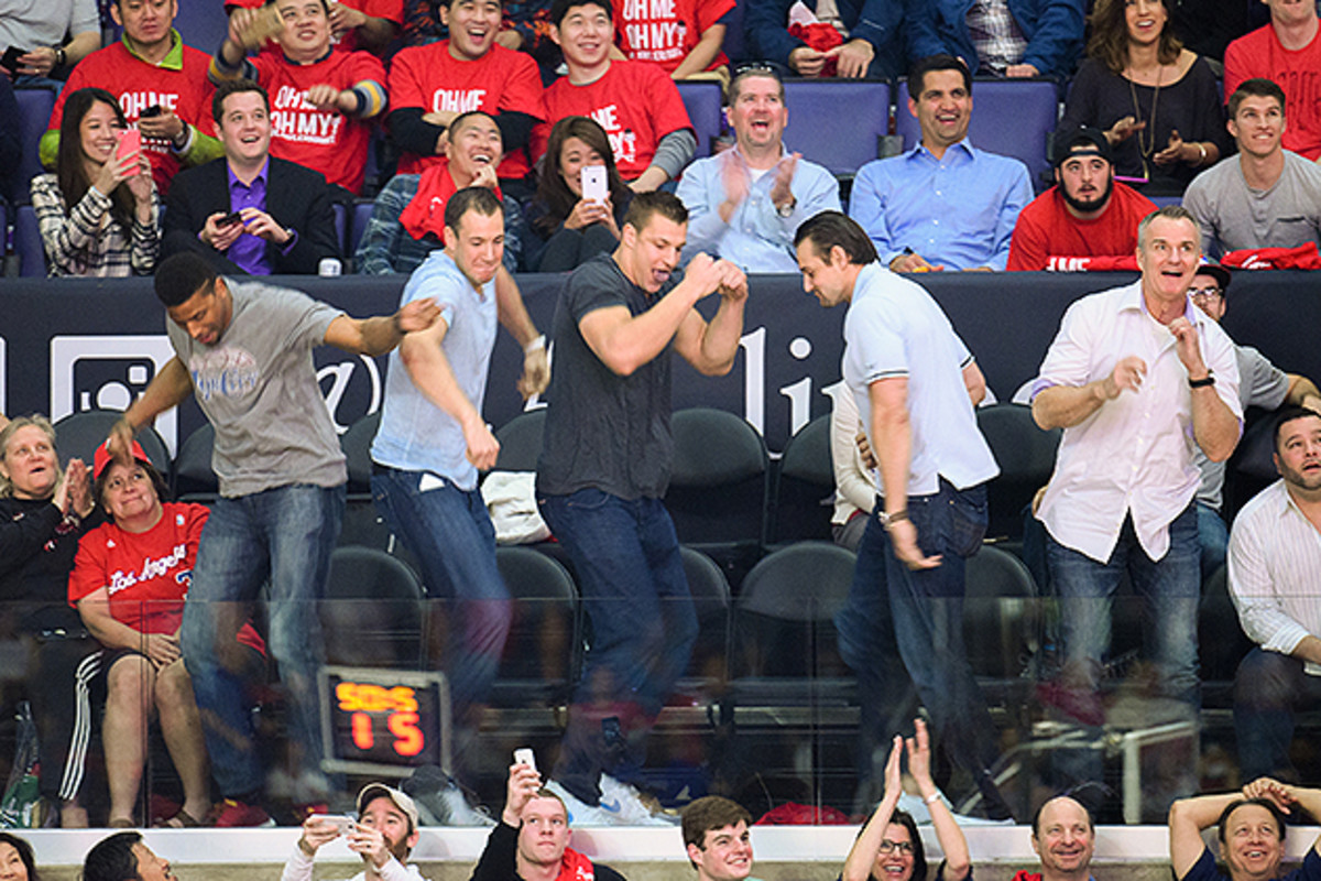 Rob Gronkowski (center) dances during 'Dance Cam' at a game between the Timberwolves and Clippers.