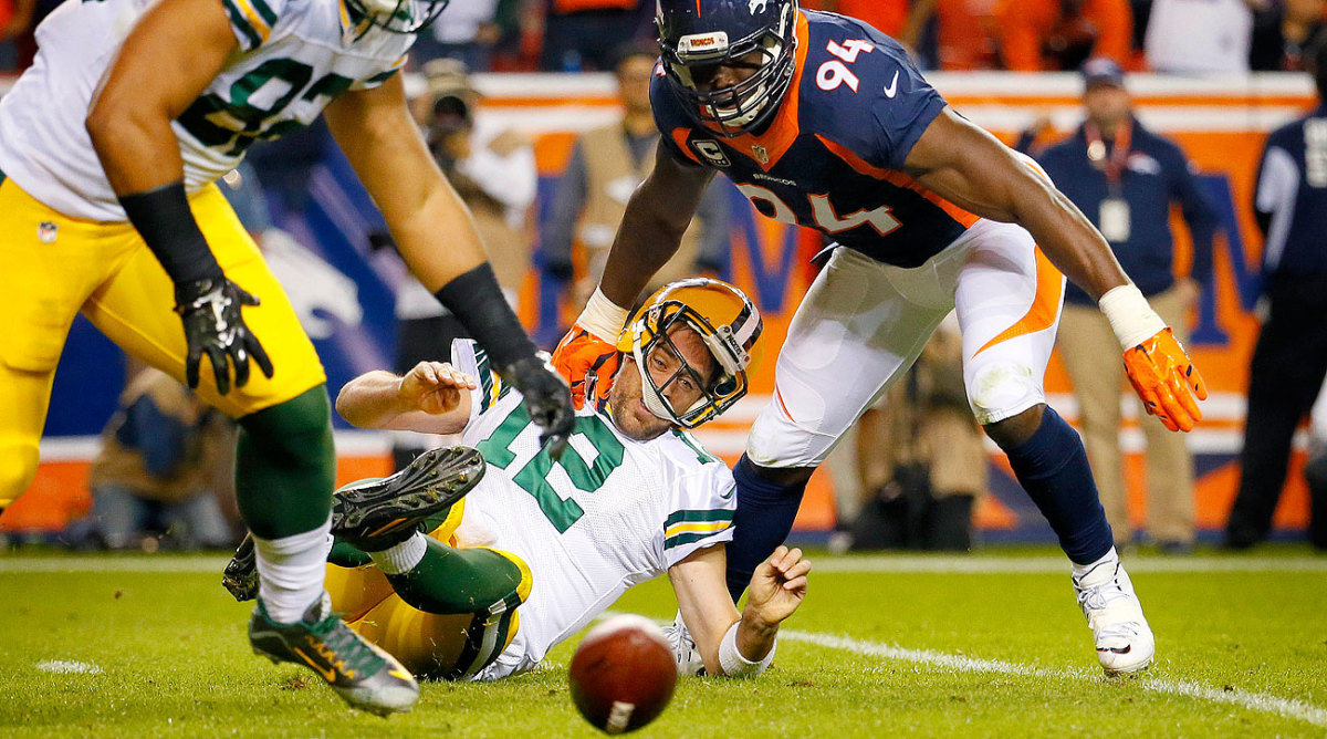 DeMarcus Ware's second-half strip sack of Aaron Rodgers led to a safety.