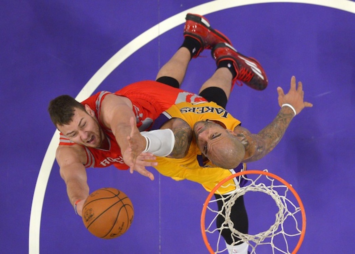 Donatas Motiejunas (l) needs to provide quality minutes for the Rockets to stay in contention. 