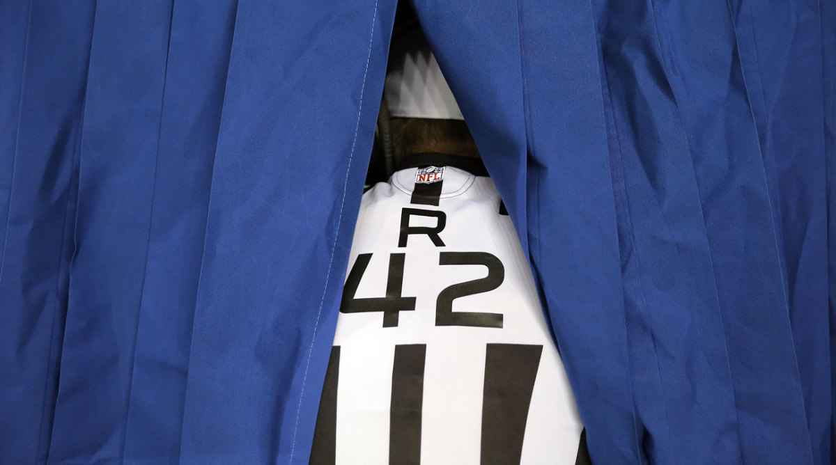 nfl-officiating-referee-in-replay-booth.jpg