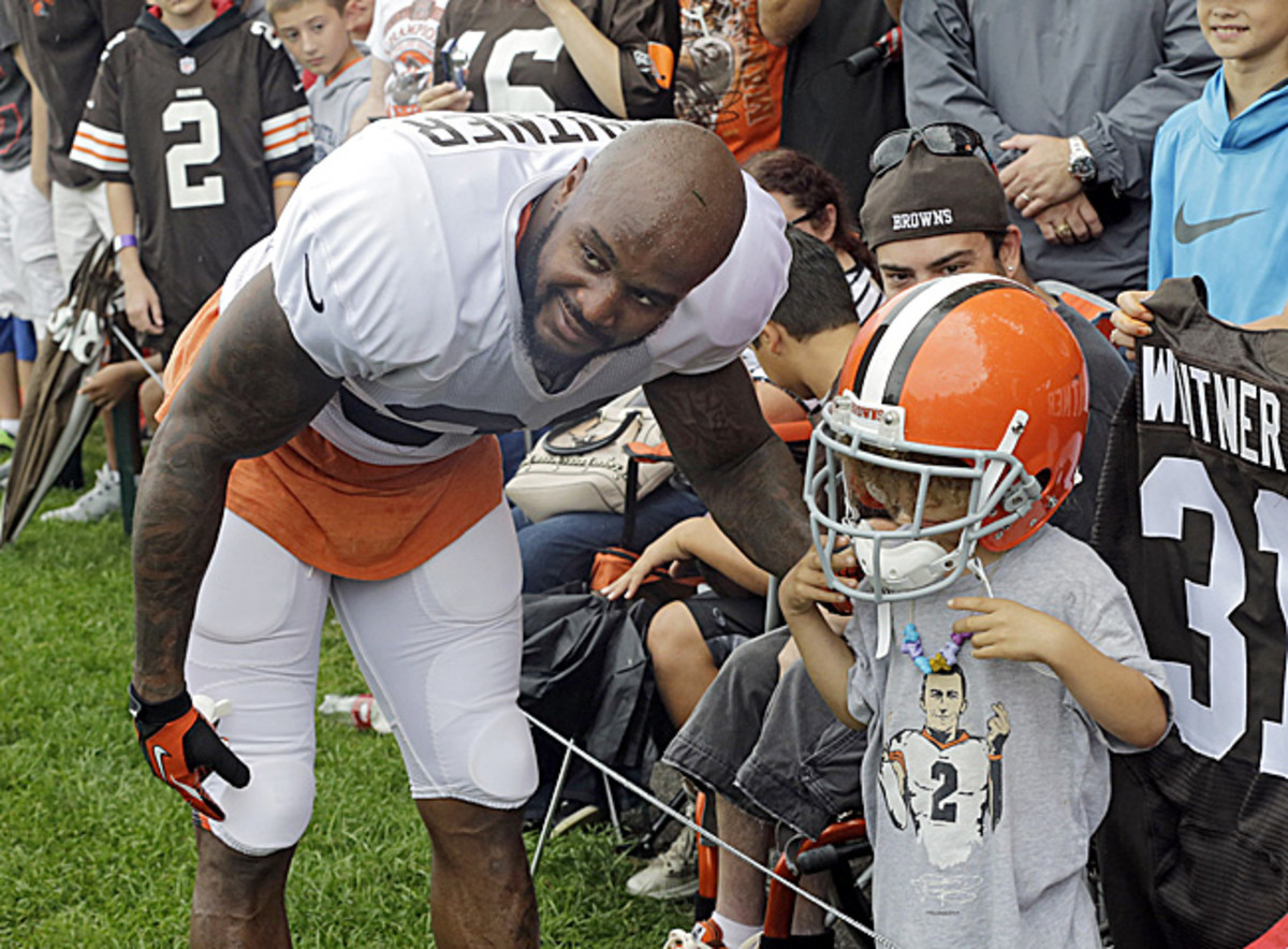Homecoming: Donte Whitner, at 2014 training camp, returned to the hometown Browns last season. (Mark Duncan/AP)