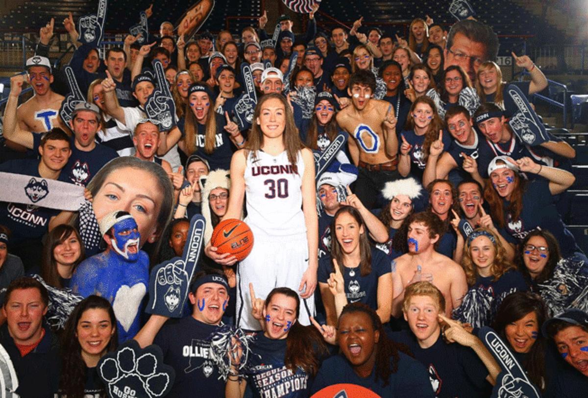 Stewart is the latest face of a program that has won eight NCAA titles and nine national player of the year awards, beginning with Rebecca Lobo (seated to Stewart's left), the POY in '95.