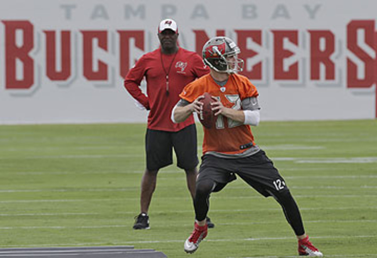 Coach Lovie Smith sees Josh McCown's leadership as an irreplaceable commodity. (Chris O'Meara/AP)