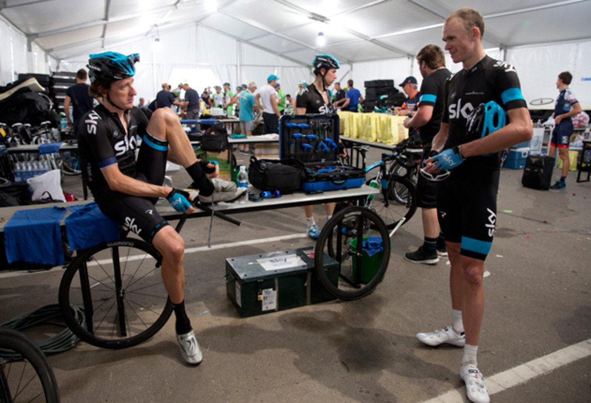 Sir Bradley Wiggins (L) chats with Chris Froome (R) ahead of stage two of the 2013 Tour of Oman from Fanja in Bidbid to Al Bustan in Muscat, Oman.