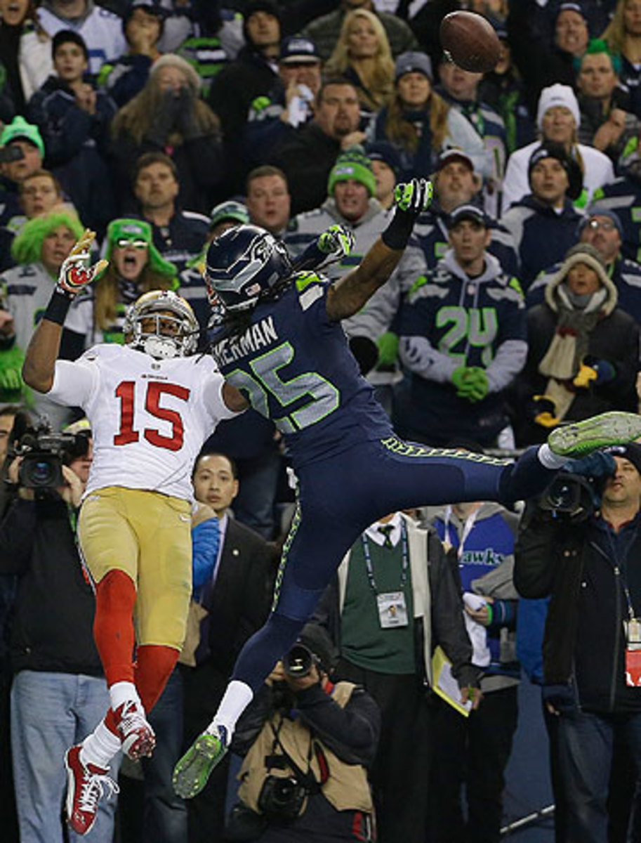 More fireworks are expected when Michael Crabtree and Richard Sherman meet again this fall. (Matt Slocum/AP)