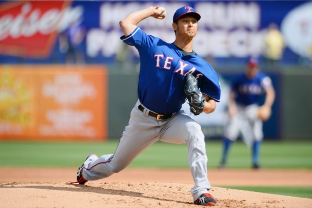 Yu Darvish has been slowed by a stiff neck during spring training. (Masterpress/Getty Images)