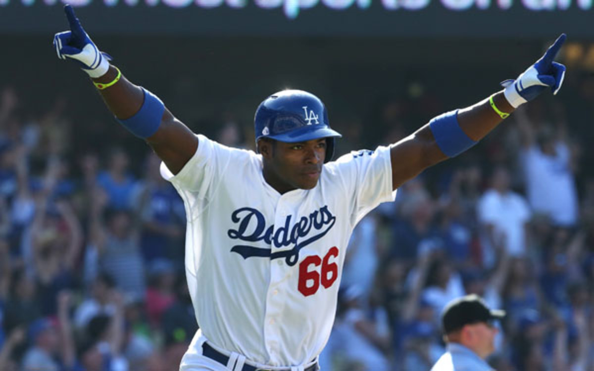 Yasiel Puig hit .319 with 19 homers in 104 games this season. (Stephen Dunn/Getty Images)