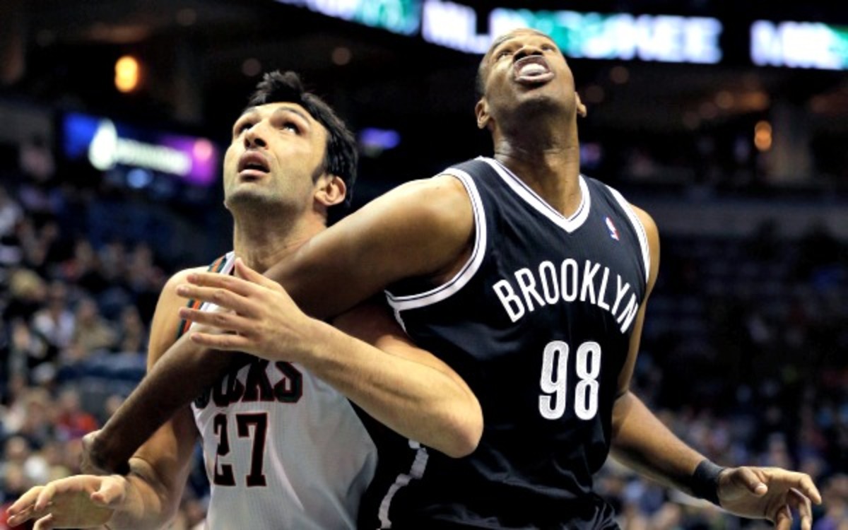 Nets center Jason Collins provides the team rebounds and toughness inside the paint.  (AP Photo/Jeffrey Phelps)