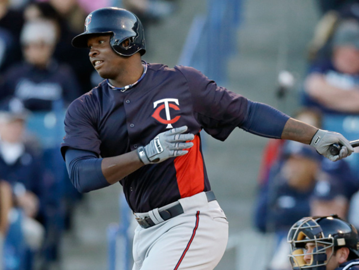 Miguel Sano won't be taking part in the 2014 season after reconstructive elbow surgery. (Kathy Willens/AP)
