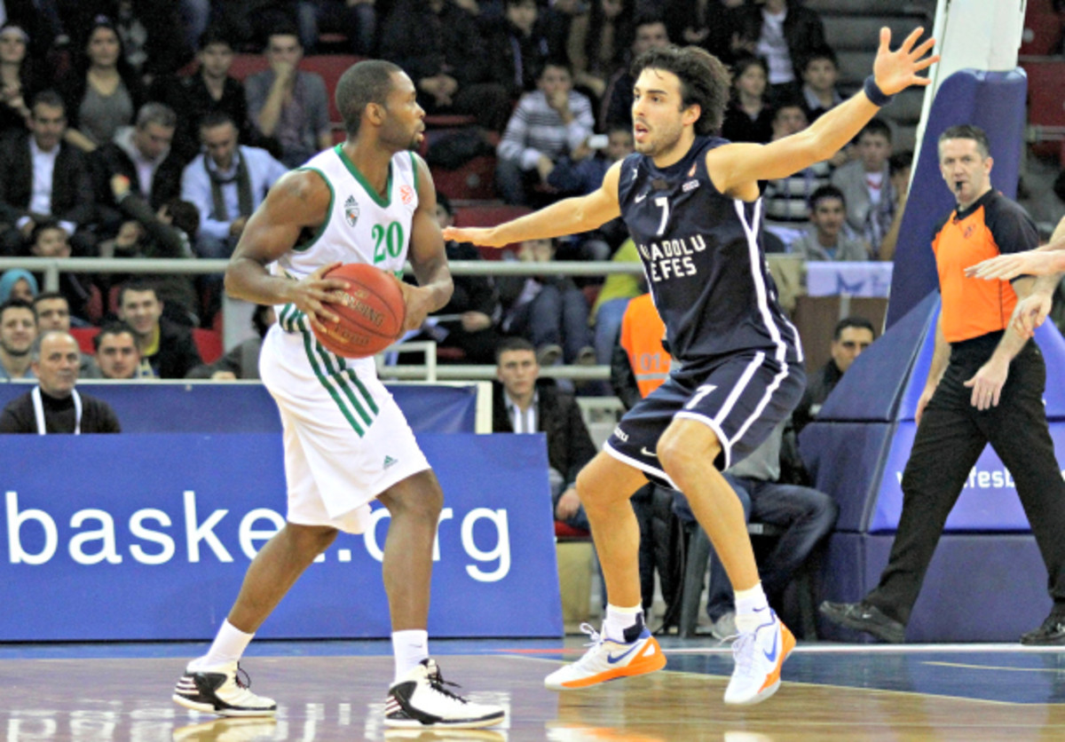 Sasha Vujacic (right) established his basketball reputation on long-range shooting and pesky defense.