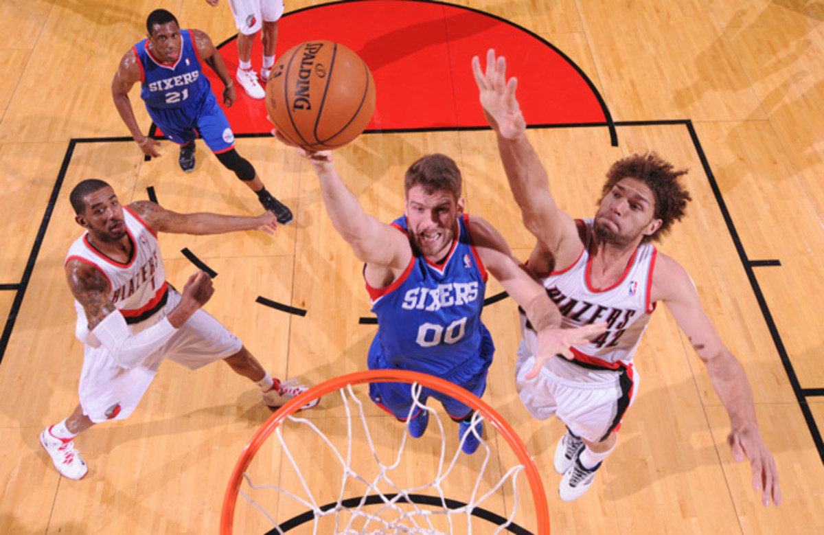 Spencer Hawes leads the 76ers in rebounds per game (8.7) and three-point shooting (41.1 percent).
