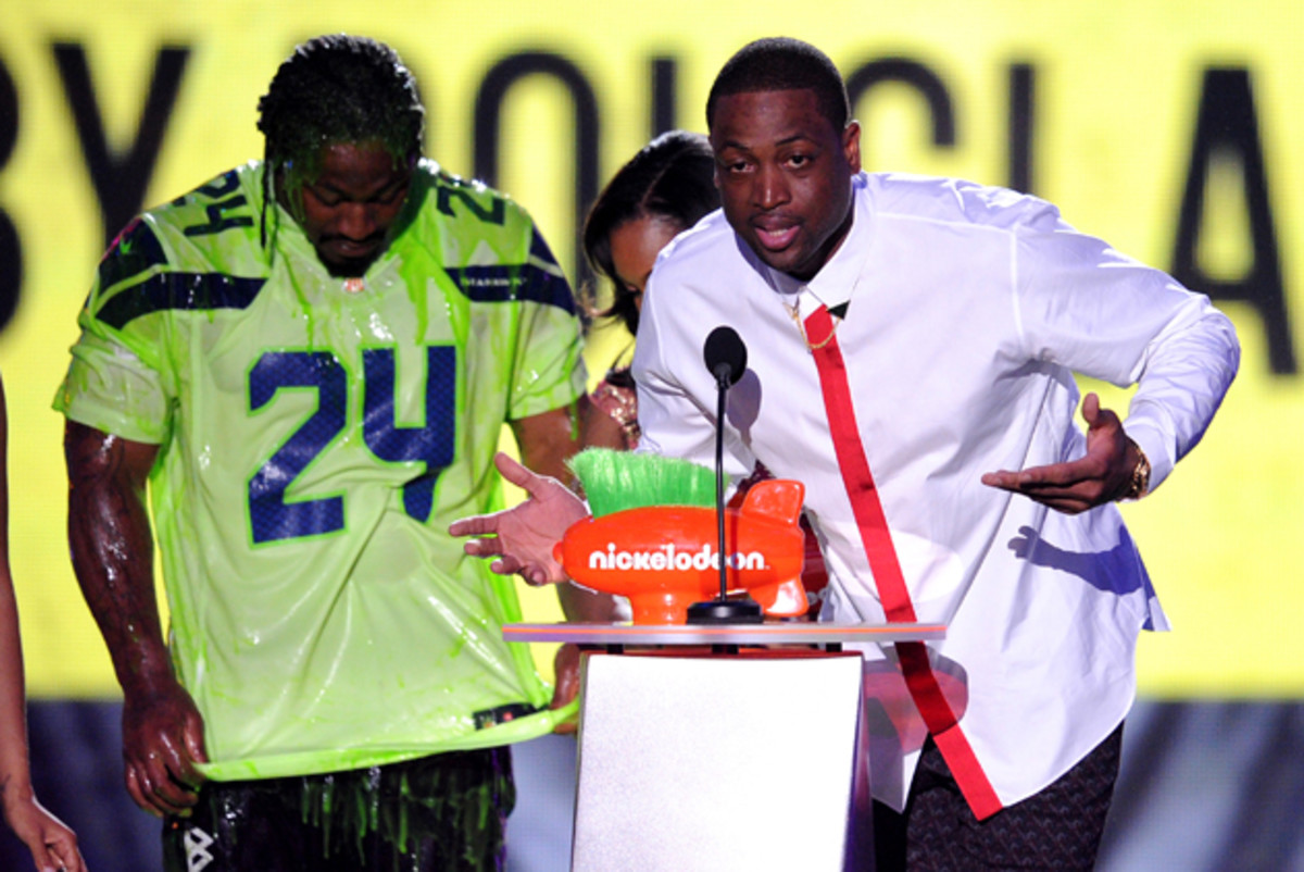 At the Kids Choice Awards, Dwyane Wade accepted "King of Swag" while Marshawn Lynch got slimed. 