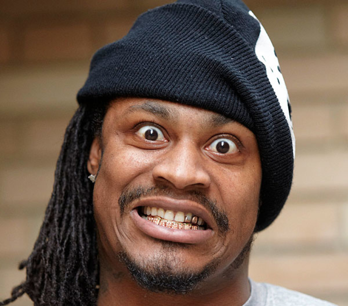 2012-marshawn-lynch-deanne-fitzmaurice-si2.jpg