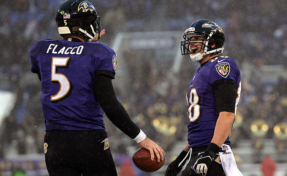 The kinship between Joe Flacco and Dennis Pitta is one of the reasons why it was smart for the Ravens to lock up the tight end before he hit the open market. (Patrick Smith/Getty Images)