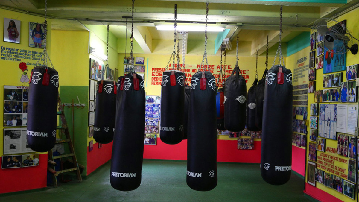 Pavao-Pavaozinho is a favela home to a gym where champions come to train. Owner Claudio Coelho now teaches a combination of boxing and jiu-jitsu there. 