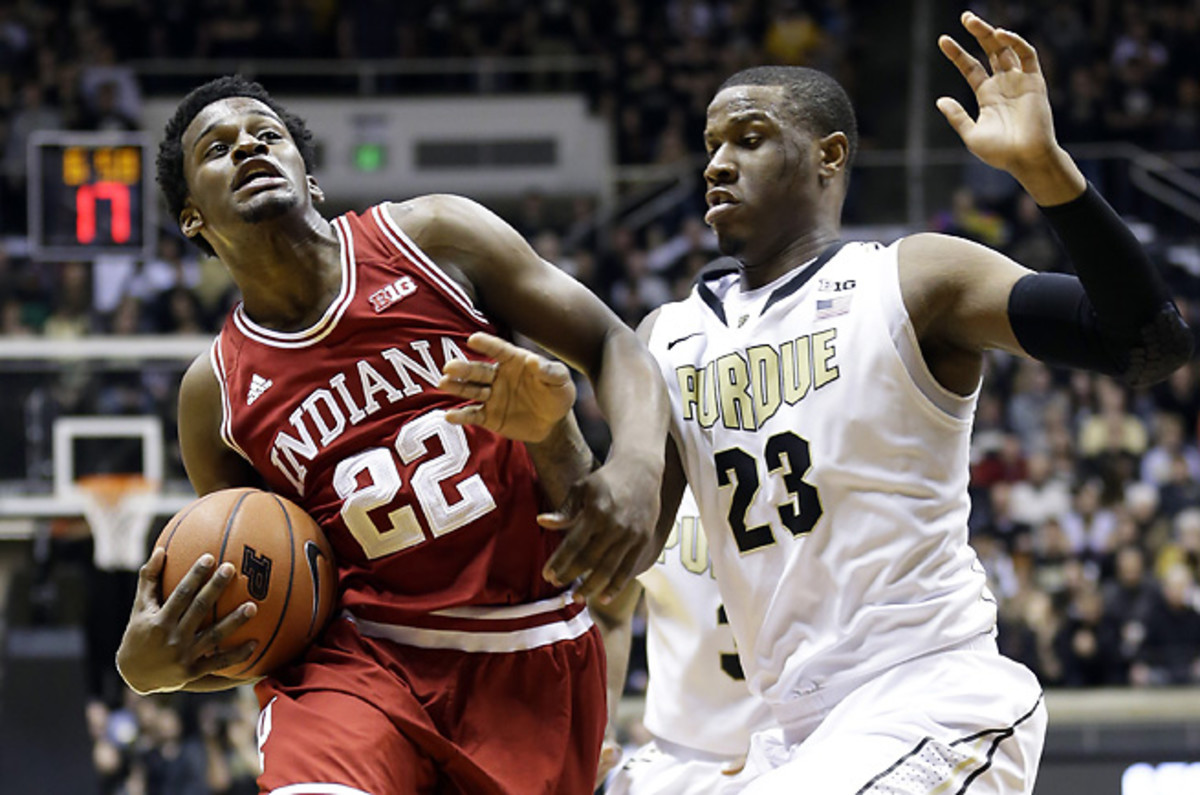 Jay Simpson (right) will have his career prematurely ended, but he will remain on scholarship.