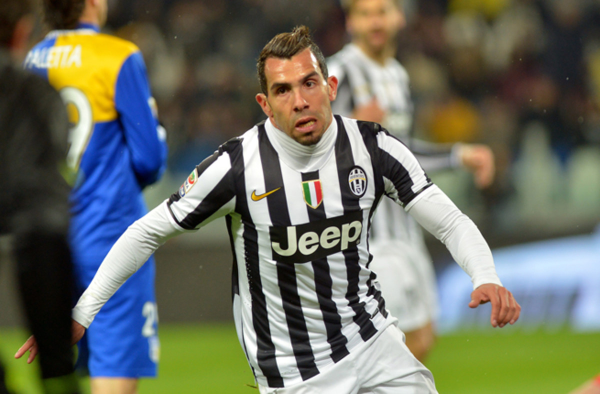 Juventus forward Carlos Tevez celebrates scoring one of his two goals against Parma in Serie A action on Wednesday.