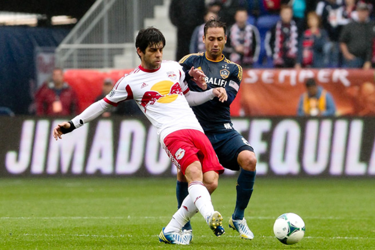 Former Brazil midfielder Juninho, left, played for the New York Red Bulls last season. The veteran retired on Monday.