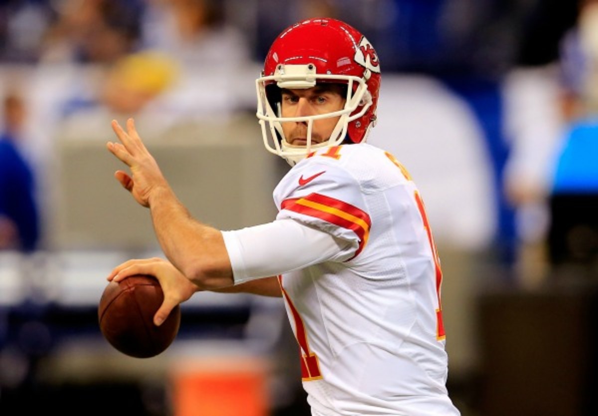 Alex Smith set career highs in passing yards and touchdowns in 2013. (Rob Carr/Getty Images)