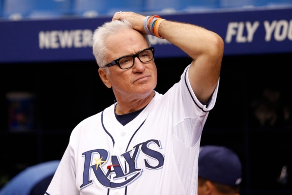 Joe Maddon is looking for answers wherever he can find them. (Brian Blanco/Getty Images)