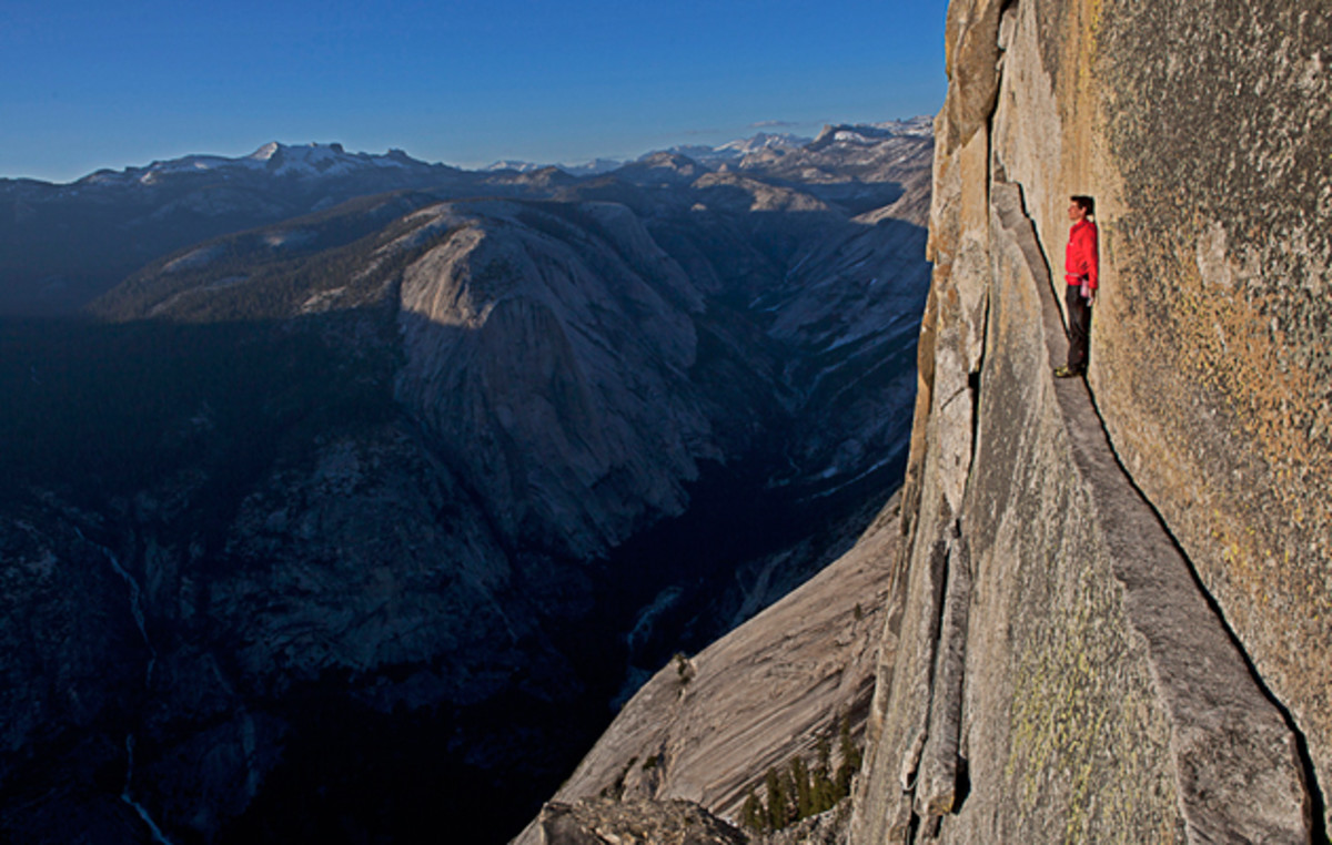 Jimmy Chin captures Alex Honnold reenacting his rope-less free climb of the 2,500-foot northwestern face of Halfdome, arguably the hardest free solo climb to date in Yosemite National Park. 