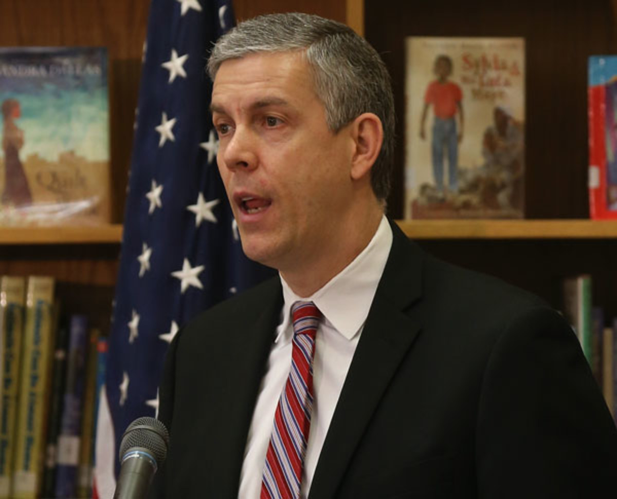 Eric Holder And Arne Duncan Visit Washington DC Elementary School