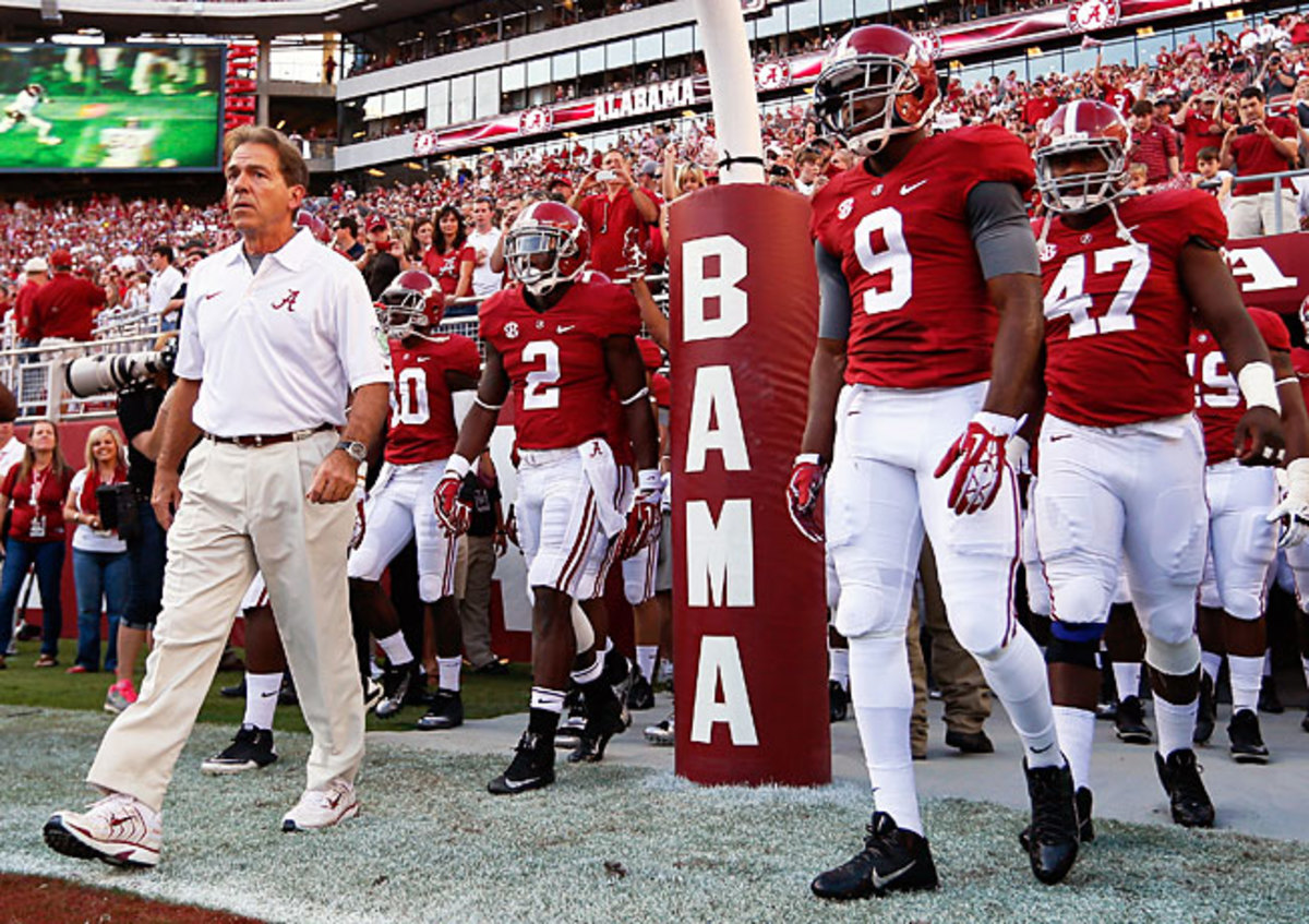 Nick Saban (far left) wants 'Bama to get back to basics after ending 2013 with two straight losses.