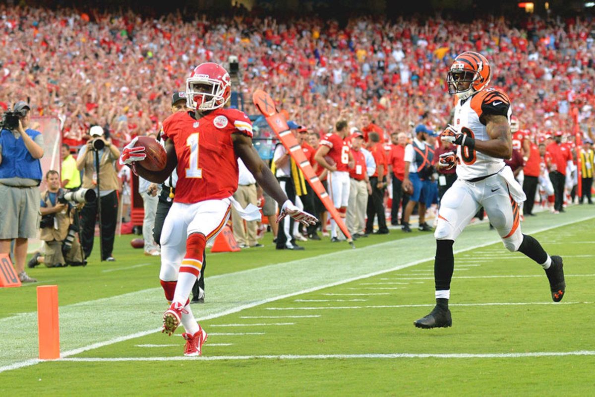 De'Anthony Thomas taking the ball across the goal line against the Bengals on Thursday. (Peter Aiken/Getty Images)