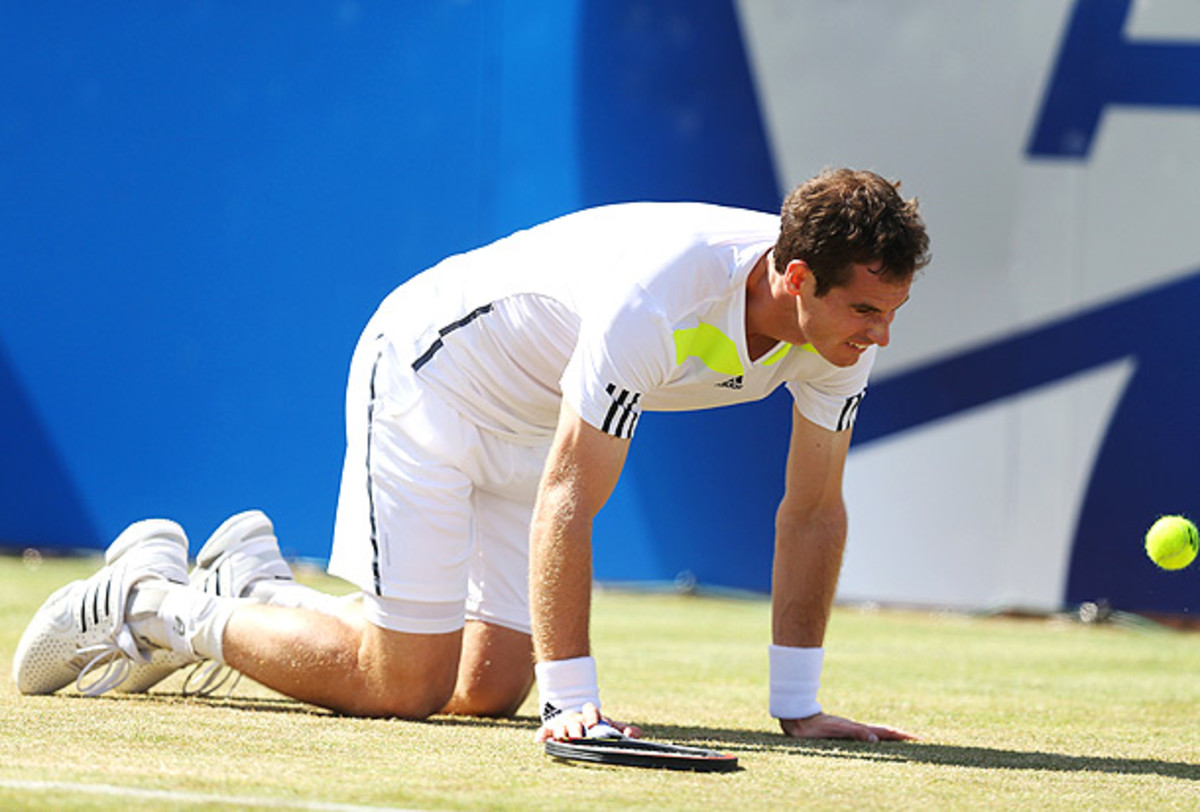 Defending champion Andy Murray couldn't quite find his game on the grass today. (Steve Bardens/Getty Images)