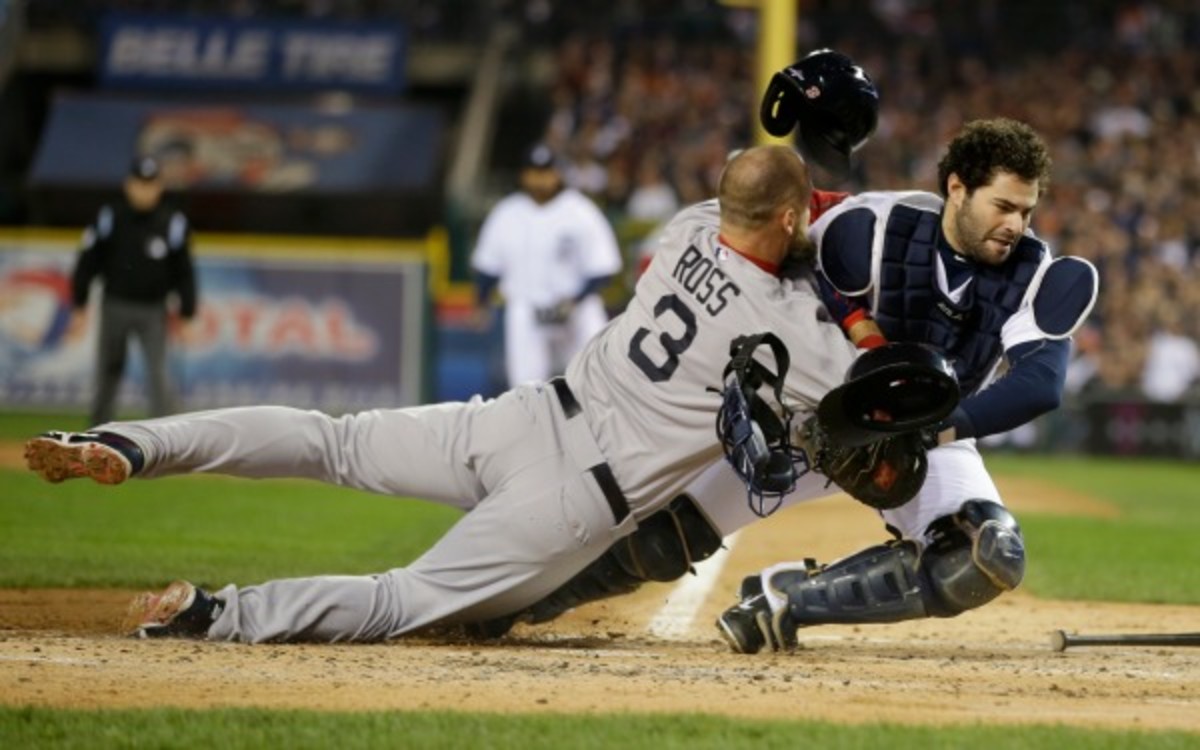 Boston Red Sox's David Ross rams into Detroit Tigers catcher Alex Avila in last year's ALCS. (AP Photo/Matt Slocum)