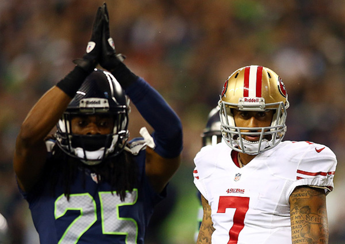 'If I throw it [the ball] a foot farther ... now you're the goat, Richard Sherman,' said Colin Kaepernick (right). 