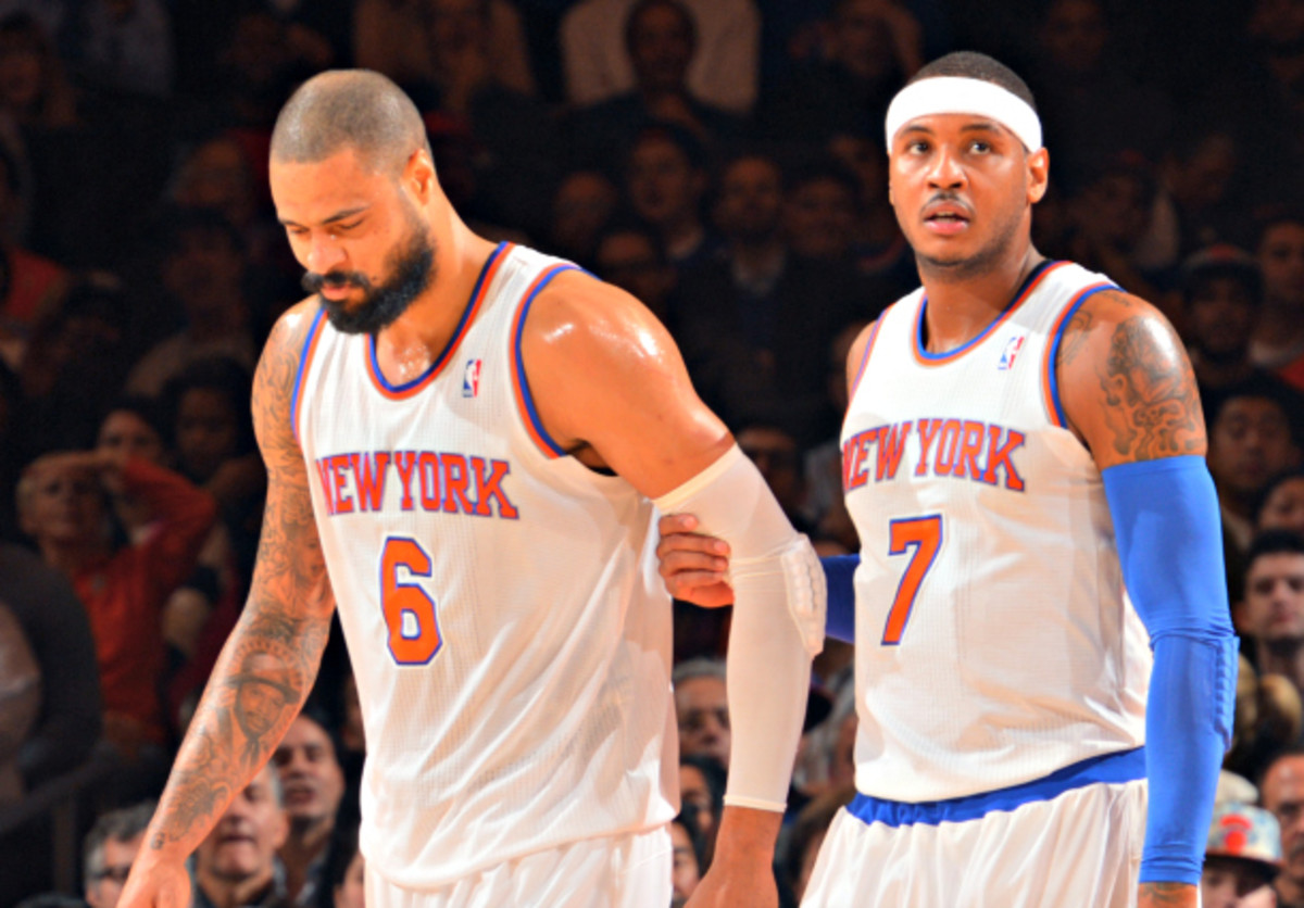 Tyson Chandler and Carmelo Anthony are none too pleased with the Knicks' current situation. (Jesse D. Garrabrant/NBAE via Getty Images)
