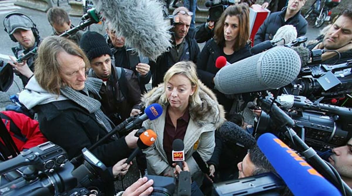 Michael Schumacher's manager Sabine Kehm (center) broke an uneasy silence on his condition.