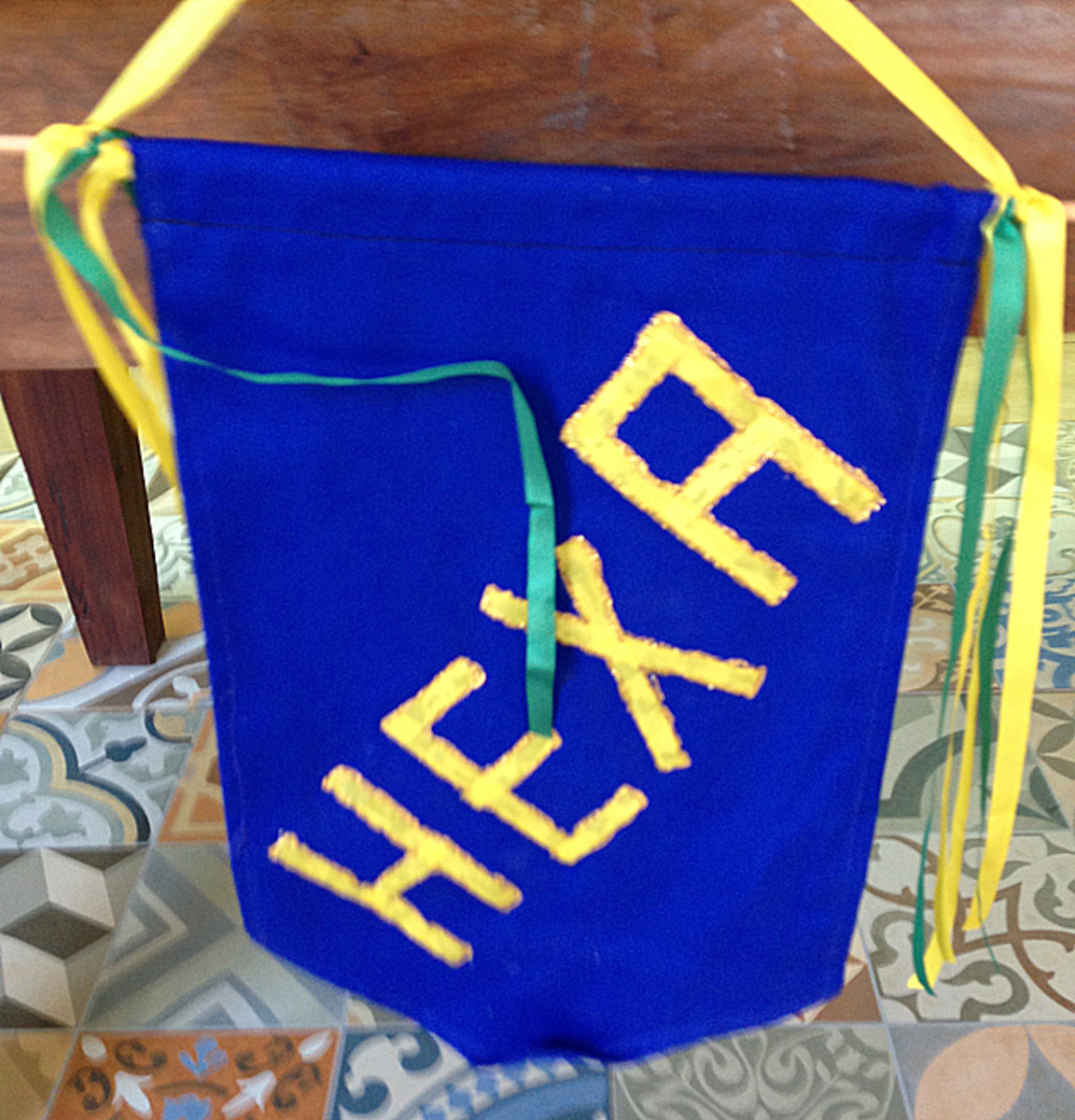 A sign sold in a local store -- which means the number six, or how many championships Brazil would have if they win the World Cup this year.