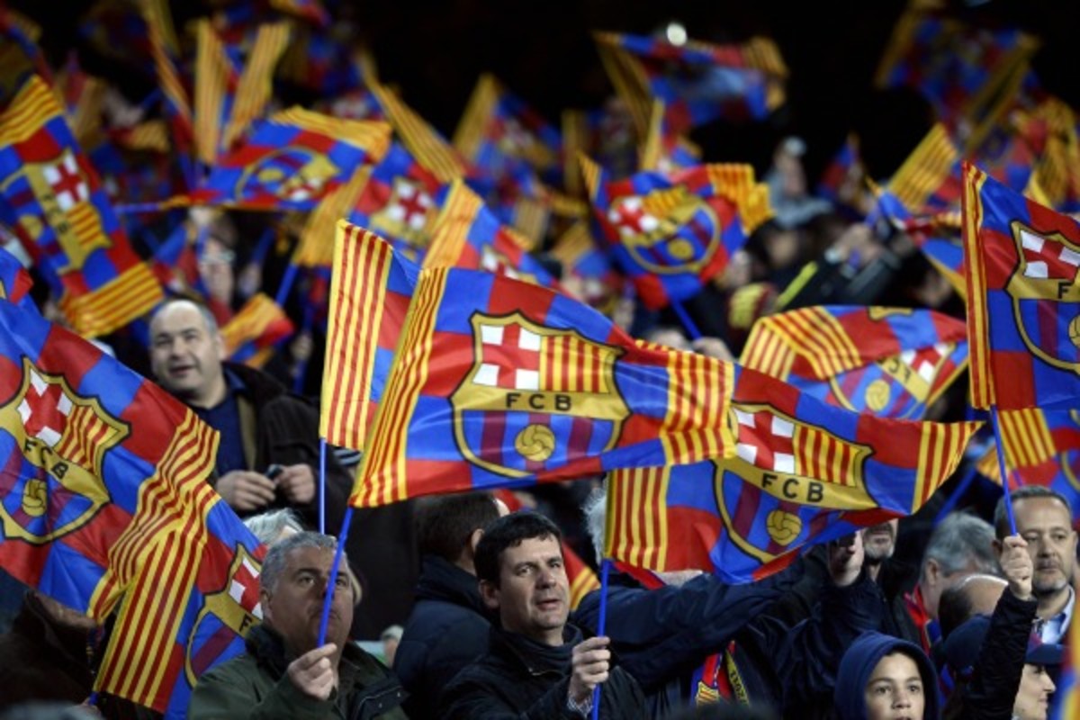 FC Barcelona fans aren't waving their flags over FIFA's latest sanctions. (Lluis Gene/Getty Images)