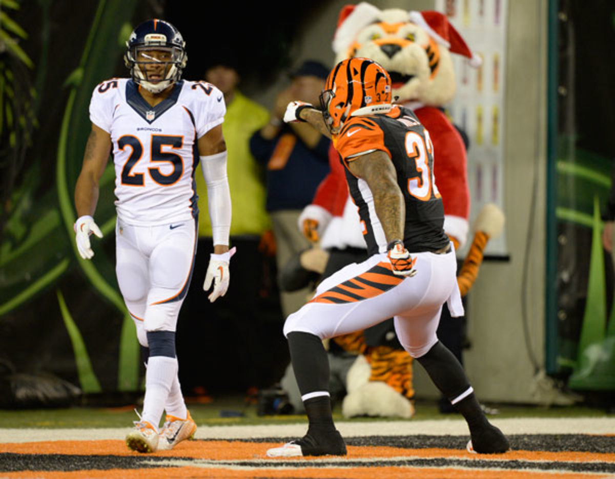 Chris Harris and Jeremy Hill :: Getty Images
