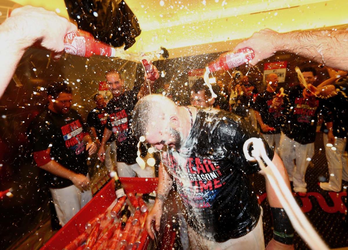 2014-1007-St-Louis-Cardinals-Carlos-Matt-Adams-doused.jpg