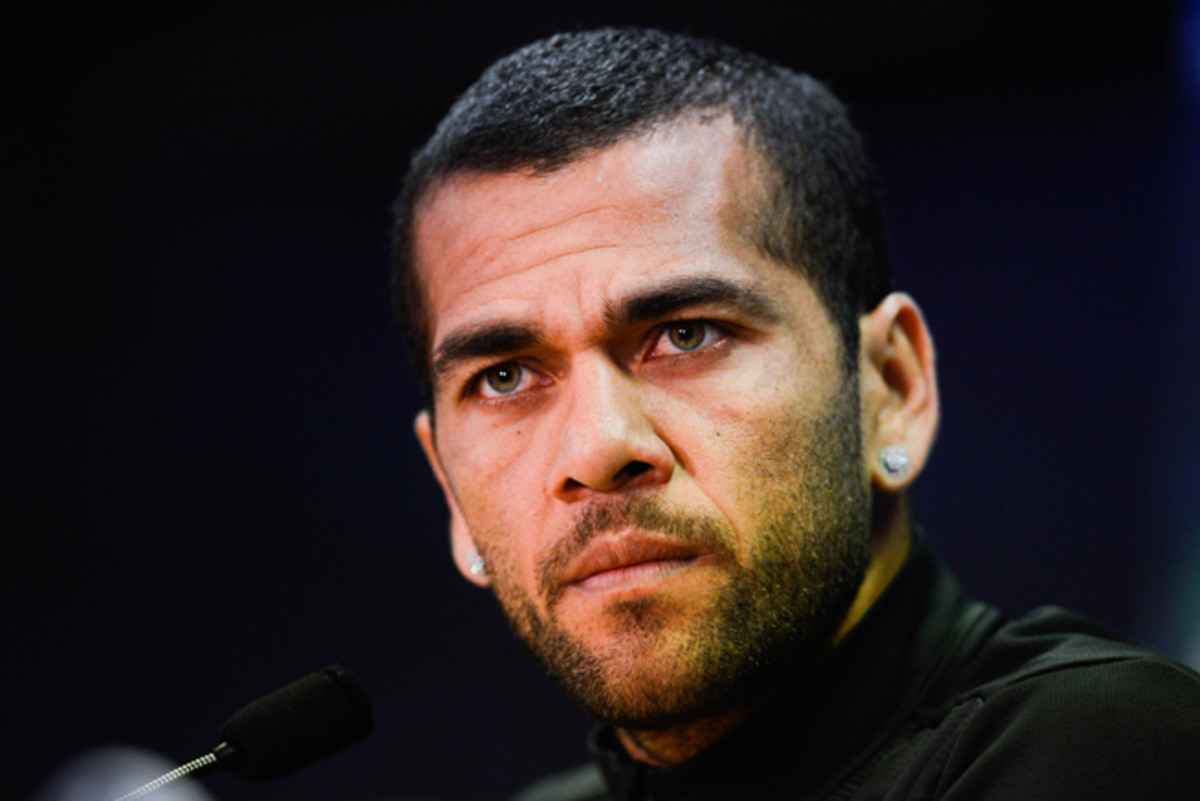 Barcelona's Dani Alves was the target of racial abuse in a match against Villarreal, which was fined for the incident. 