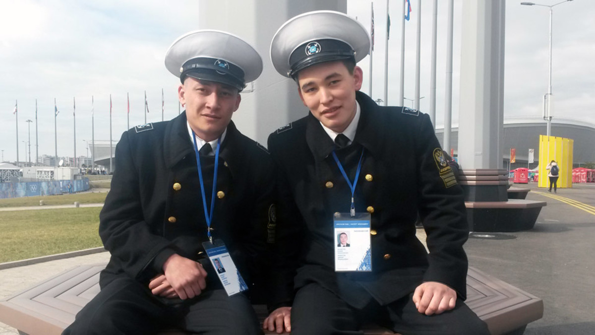 Russian navy men Damir Khamitov and Alexei Schivilov hope to check out a hockey game before the Olympics end.